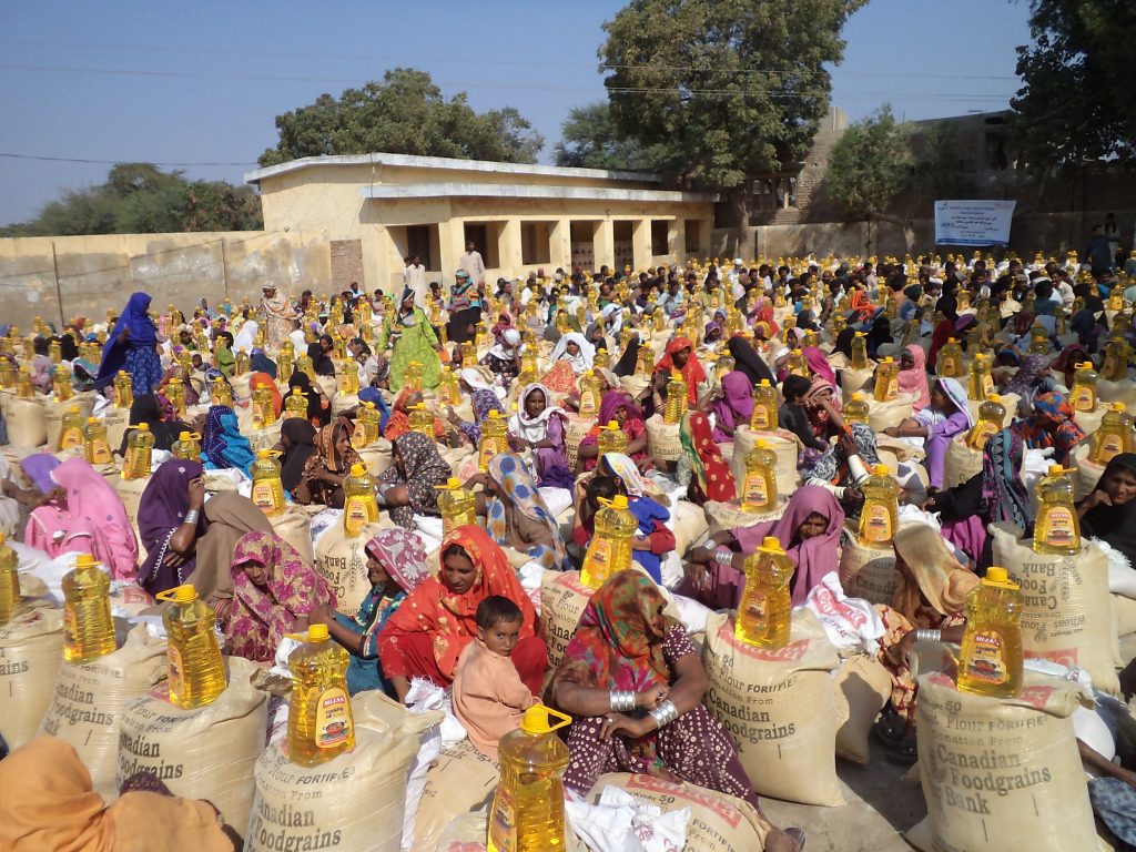 Distribution of Food Packages in Tando Muhammad Khan Sindh 2011